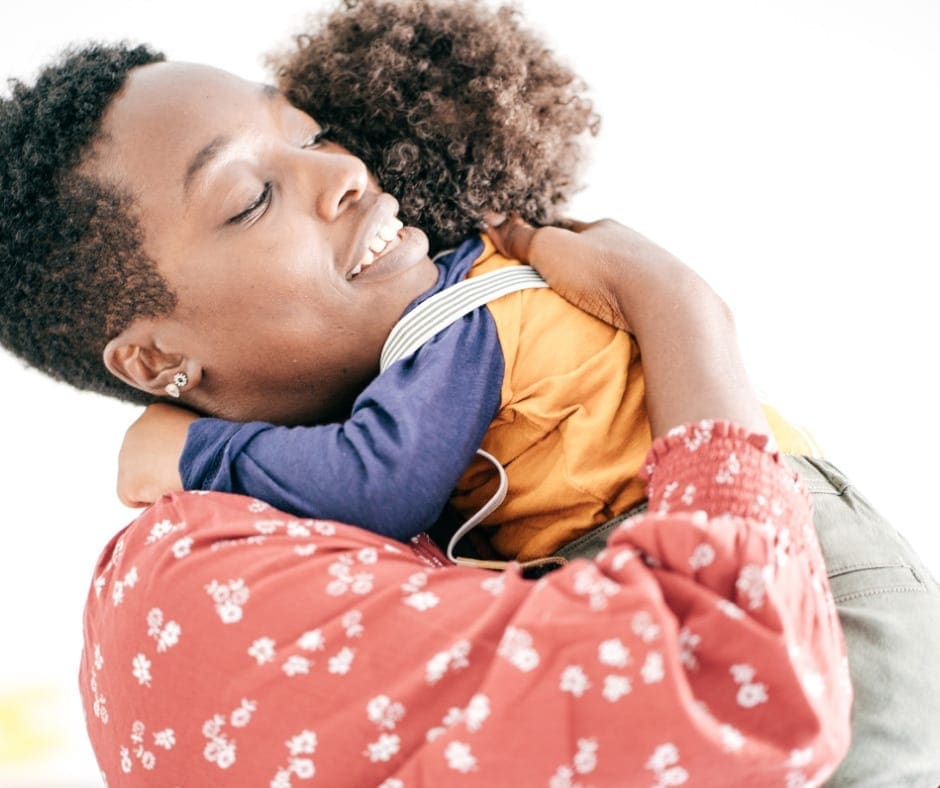 mother and child sharing a warm hug